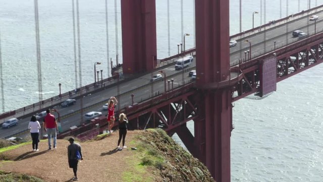 SAN FRANSISCO, CALIFORNIA, UNITED STATES OF AMERICA, NOVEMBER 3 Zooming timelapse of people posing and taking pictures at the Golden gate bridge, in San Fransisco, California, United states of america