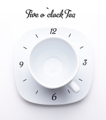 Stylized concept of the clock from tea or coffee cup on white saucer isolated on white. Top view