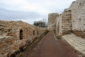 The defensive stony walls of the medieval Izborsk fortress, Pskov region, Russia.