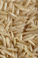 uncooked grains of brown basmati rice