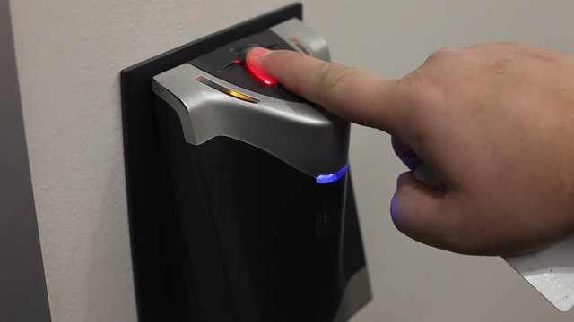 Bio-metric fingerprint reader scanning and authorizing acces.