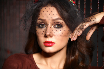 Portrait of a beautiful woman with flowers in her hair