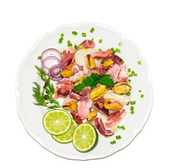 seafood on a plate isolated on white background. top view