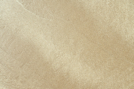 Textured Wet Sand Backgroud