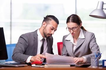 Woman and man in the business concept