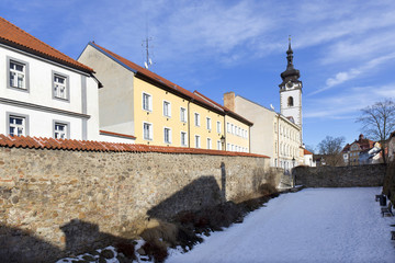 Colorful medieval Town Pisek above the river Otava with the deanery Church, Czech Republic