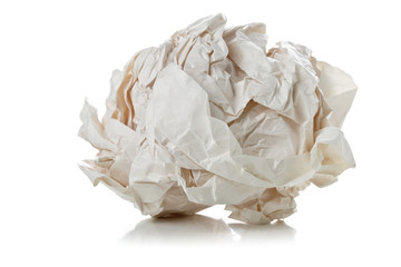 Crumbled white paper ball on white background