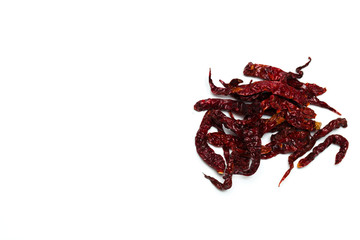 Fototapeta premium A dried chillies lay flat isolated over white background