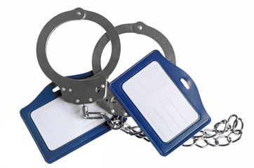 Handcuffs with chain and name tag