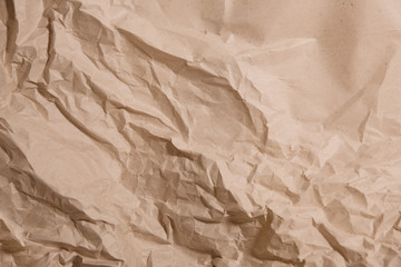 Crumpled kraft paper. Trendy hipster background. Space for your