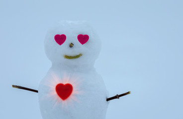 scarlet heart and snowman. Valentine's day.