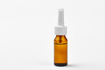 Nasal spray vial. Bottle with medicine liquid. Health as a priority.
