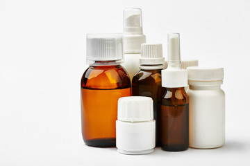 Set of remedy bottles isolated. Liquid medicine and pill containers. Prescription for drugs.