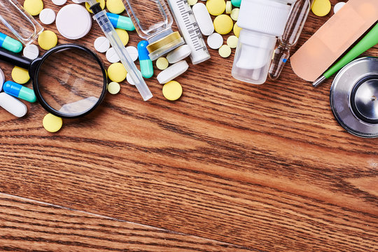 Pills and medical tools. Advertisement of medicine production.
