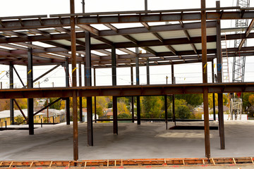 Multi story concrete and steel commercial building under construction.