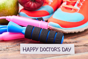 Sneakers, jump rope and card. Wish you happy Doctor's Day.