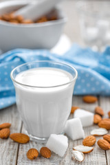 Fresh almond milk and nuts, vegan drink