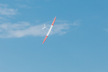 RC soaring plane on blue sky
