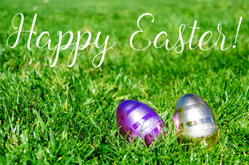 Easter eggs on the grass background