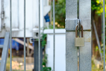 Fototapeta premium Closed metal lock door security protection padlock.