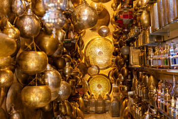 Narrow shop of traditional Moroccan lamps in the souk of Marrake