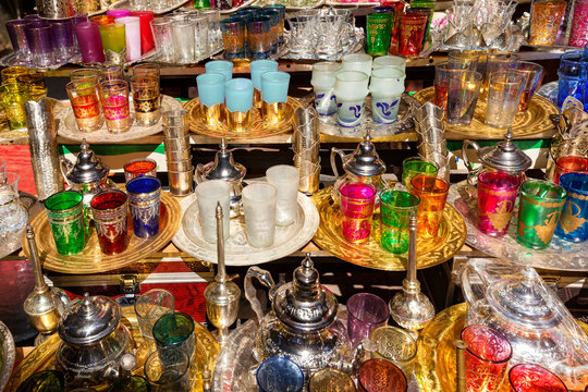 Colorfuln tea sets at a street market in the souk of Marrakech,