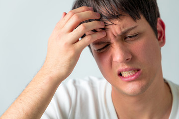 young man with fever or heat stroke