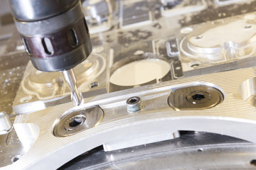 The CNC milling machine cutting the sample part with the ball endmill