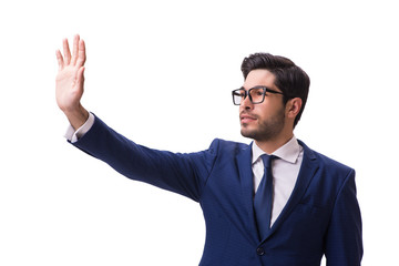 Young businessman pressing virtual buttons isolated on white