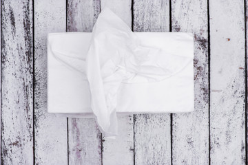 Top view white paper napkins, tissue on wooden table surface, co