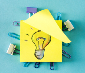 Light Bulb on a sticky note