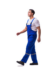 Handsome repairman wearing blue coveralls on white