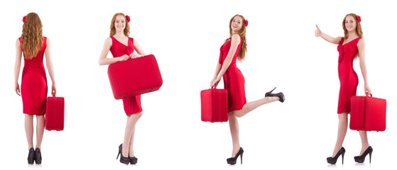 Young woman in red dress with suitcase isolated on white