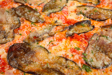 vegetable pizza with eggplant closeup macro view