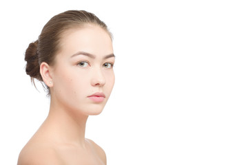 Fototapeta premium Woman with a natural beauty makeup look isolated over a white background with copyspace