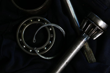 Group of screws and wrenches. Bolts, nuts, screws, wrenches, tires , ring spanners and socket wrenches in a pile on dark background.