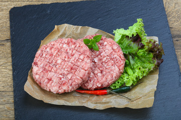 Raw burger cutlet
