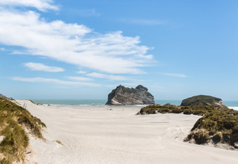 Fototapeta na wymiar sand dunes at Wharariki beach in New Zealand