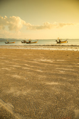 Obraz premium Traditional Thai boats near the beach. Thailand