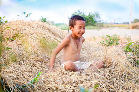 A boy thai ancient hairstyle play in farm