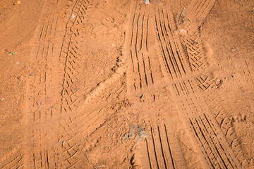 Tire tracks on dirt ground