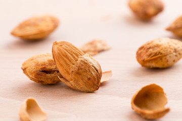 Almonds nut with shell on background