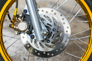 Fototapeta na wymiar Parts of Motorcycle, taillight, wheel, oil line