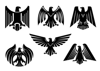 Naklejka premium Orzeł herb wektor na białym tle ikony heraldyczne ptaki