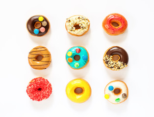 colorful donuts on white background.