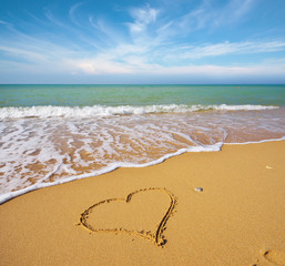 Heart on the sand of a beach.