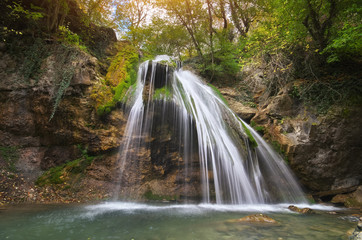 Spring waterfall and. Nature composition.