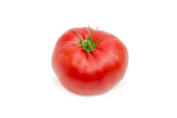 One ripe red tomato closeup