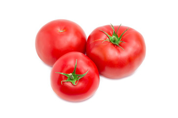 Three ripe red tomatoes closeup