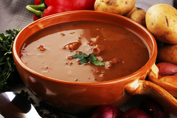Tasty Hungarian beef goulash soup bograch close-up on the table